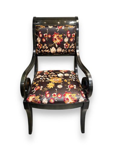Decorative chair with floral pattern on a white background